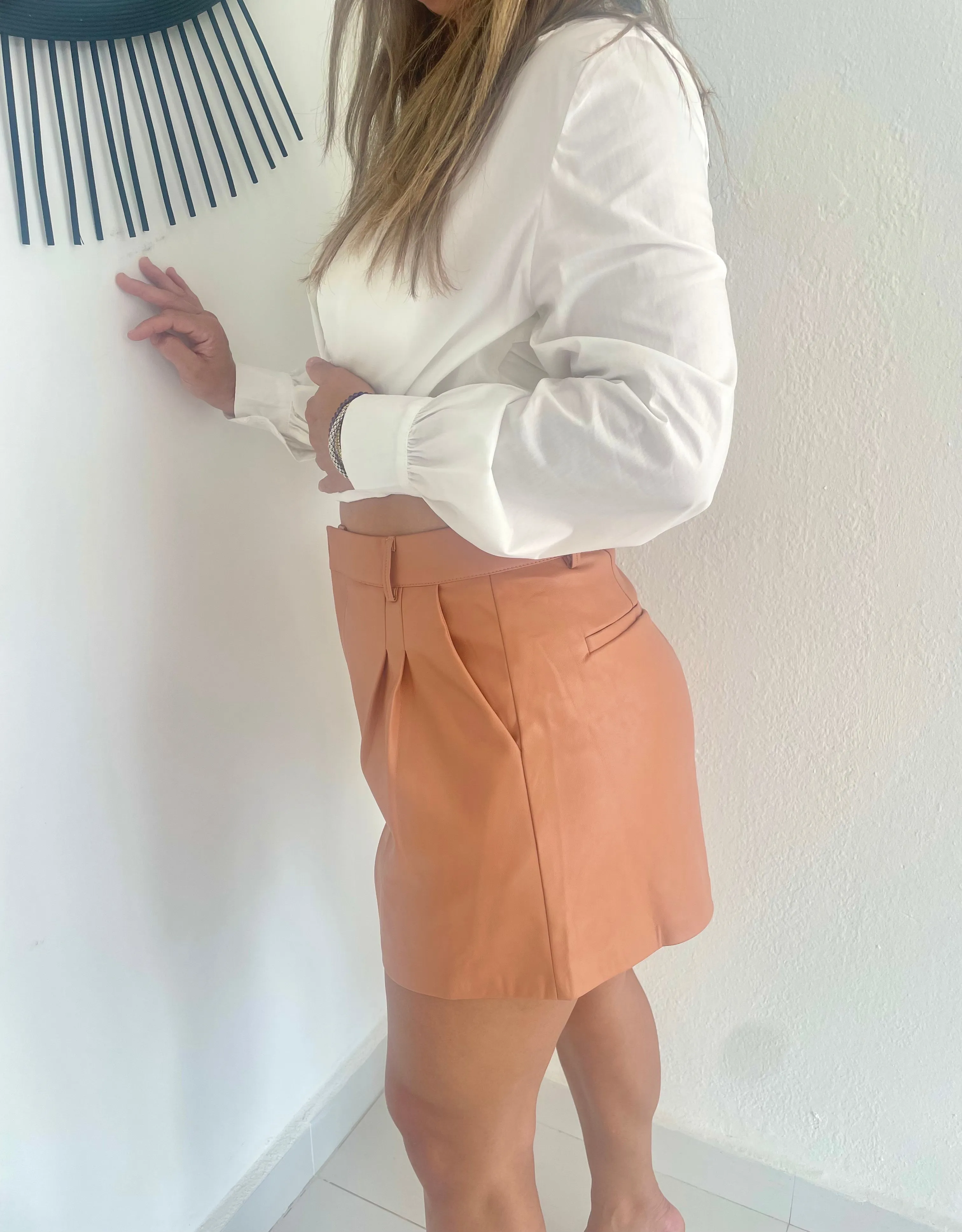 Pleated leather shorts